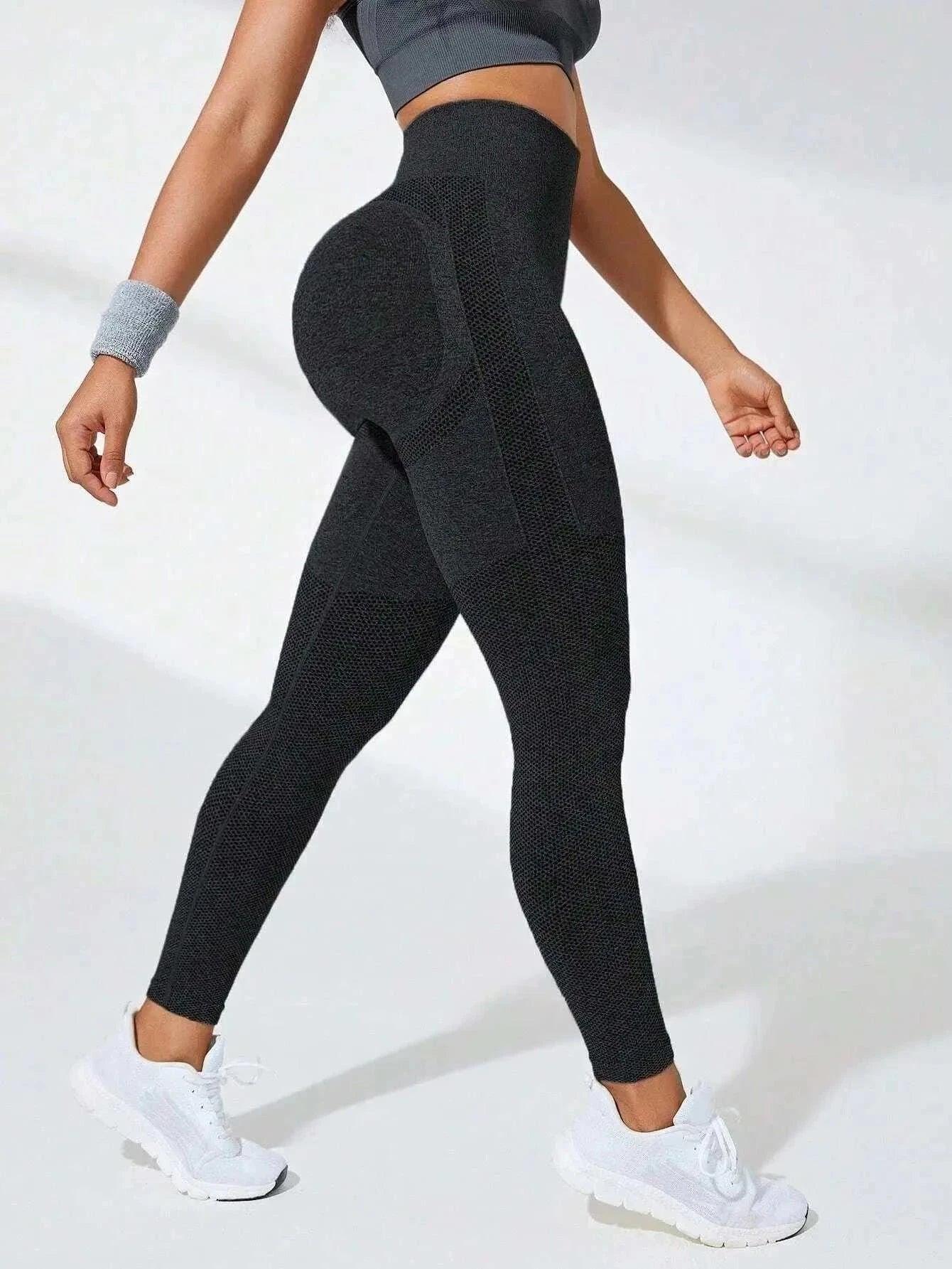 femme legging de sport noir de coter