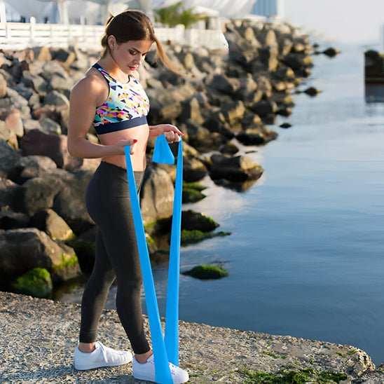 fille plage entrainement elastique musculation bleu